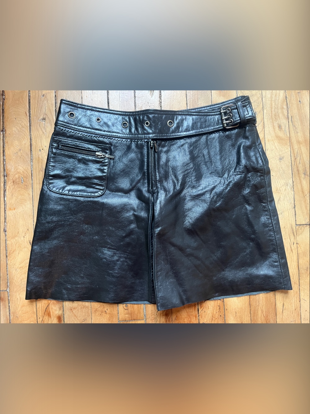 Leather skirt with belt and front flap